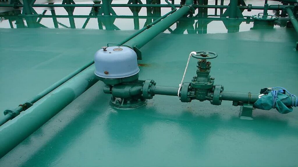 Cargo deck valves and crude oil washing controls on an oil tanker